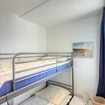 - Haus G, App 0g0710 *